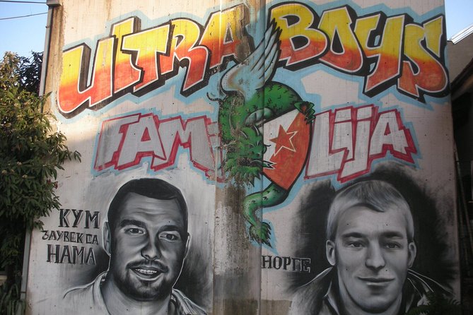 Football tour: Red Star and Partizan Ultras History - Dorcol: Partizan murals among cafes and pubs