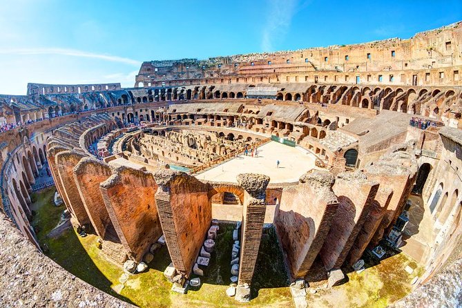 Rome: Guided Group Tour of Colosseum, Palatine Hill & Roman Forum - Entering the Colosseum