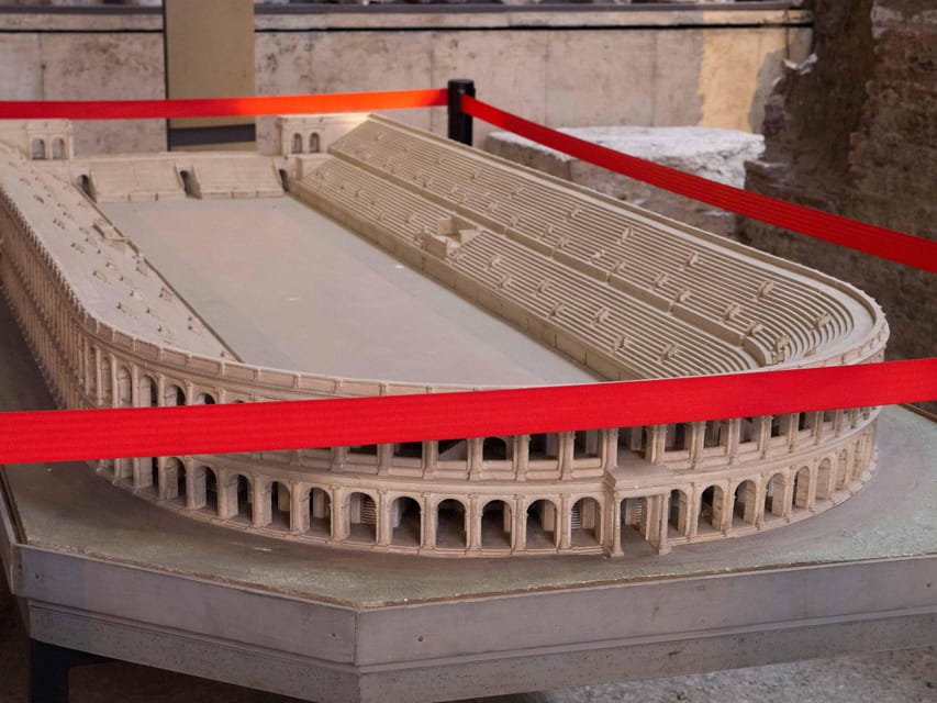 Rome: Navona Underground & Domitian Stadium Guided Tour - Walking through the Domitian Stadium ruins