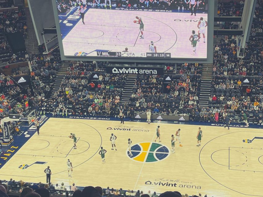 Salt Lake City: Utah Jazz Basketball Game Ticket - Wearing Jazz colors and joining the crowd