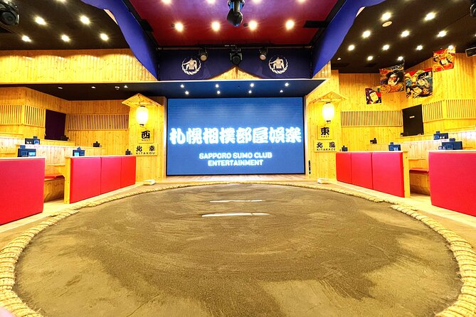 Sapporo Sumo Show Experience with Japanese Food and Photo - The best-of-three bout with retired wrestlers