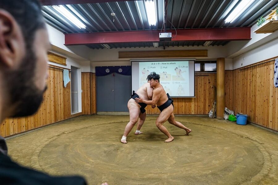 Tokyo: Authentic Sumo Wrestling Experience with Lunch - Photos, handprints, and included gifts